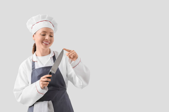 Professional chef skills and culinary expertise, woman in chefs hat holding a sharp knife, cooking and food preparation