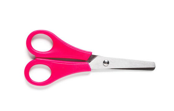 Craft and school supplies, pink childrens safety scissors with blunt tips for kids art projects, isolated on white background