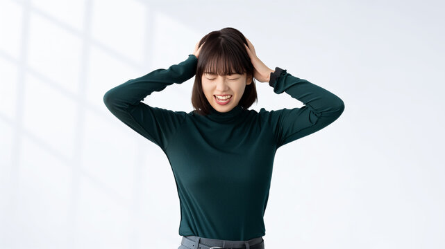 頭を抱えて悩む女性・ビジネスウーマン, Stressed Businesswoman Holding Her Head