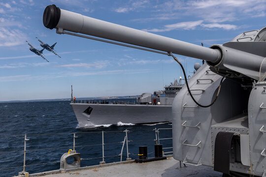 Two Military warship and two aircrafts in the Black Sea during a peacekeeping operation fly together.
