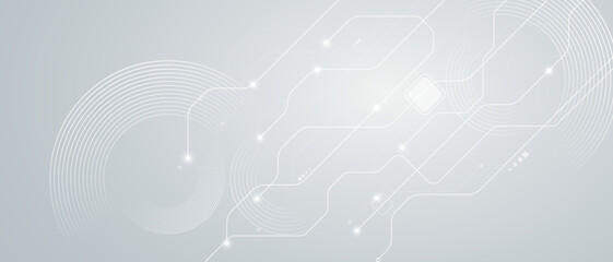 Gray technology abstract background with white circuit lines and circular pattern. © kanpisut