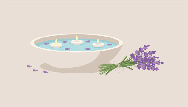 Peaceful spa setting featuring a white bowl of water with three floating candles and a bundle of fresh lavender.