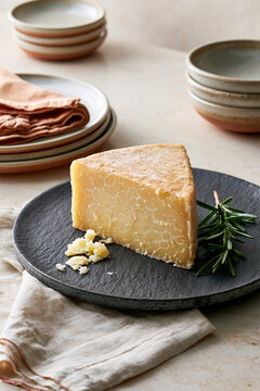 Cheese wedge with molecular ID pattern on slate showcasing food authenticity verification and premium dairy origin traceability