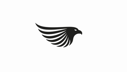 Fototapeta premium Silhouette of flying eagle against plain background