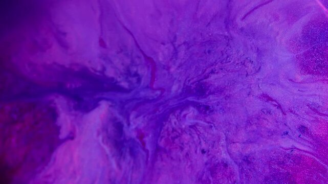 Ink spatter. Paint mix. Defocused purple pink blue color cube splash chemical texture spilling on abstract acrylic neon art background.