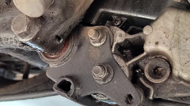 Leaking motorbike oil seeps into the bottom of the motorbike