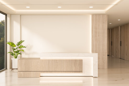 Warm Minimalist Reception Lobby with Wooden Front Desk and Blank Wall Mockup