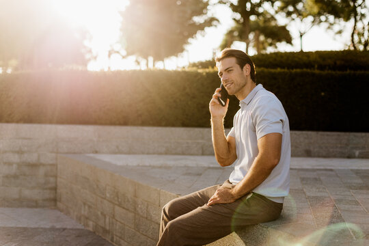 Relaxed moments in the park during golden hour with a cheerful conversation