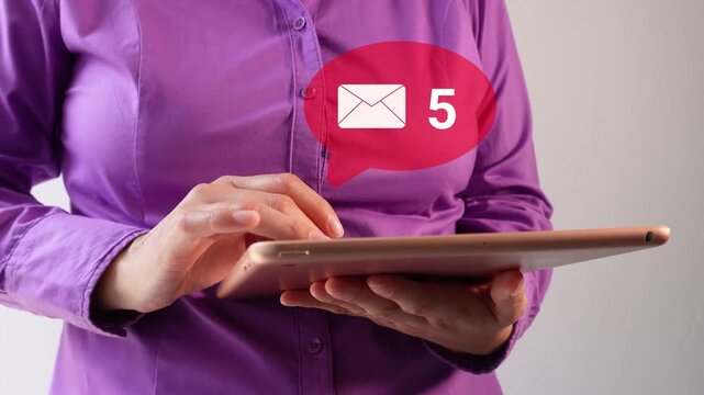 Person interacts with tablet displaying unread emails