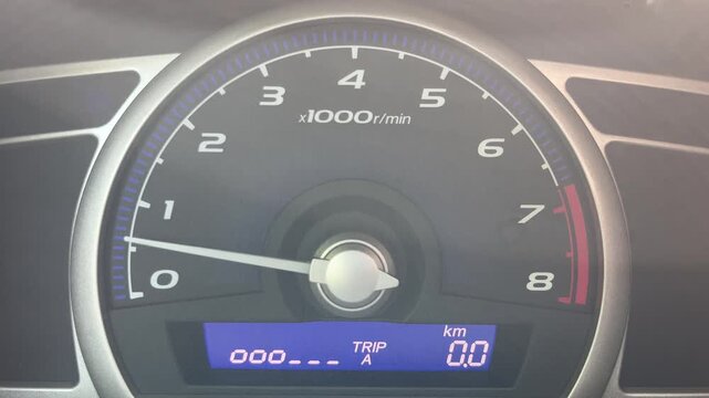 Car dashboard instrument cluster dimming in low light conditions