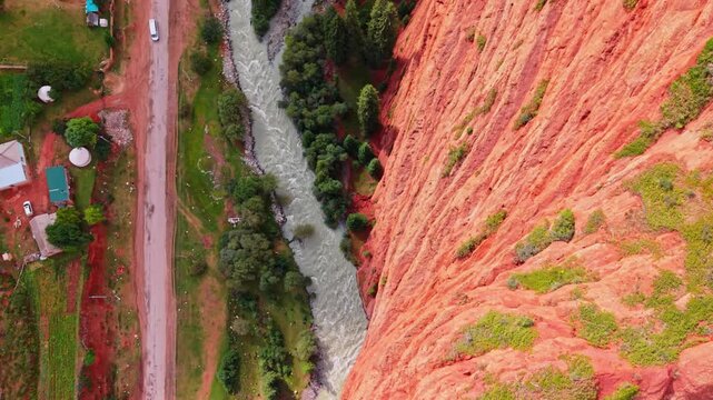 Top down drone view of seven bulls rocks river flowing through Jeti Oguz