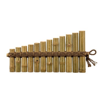 Pan flute made of green bamboo pipes bound together is isolated on a white background.
