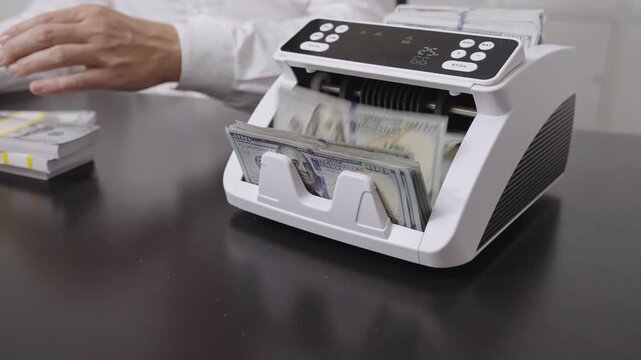 Accounting process. Investment concept. Finance managers hands with counting machine. Finance success. Financial transactions. Finance office scene with office workers hands and cash counter.