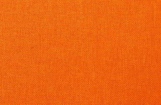 Orange linen fabric cloth texture background, seamless pattern of natural textile.