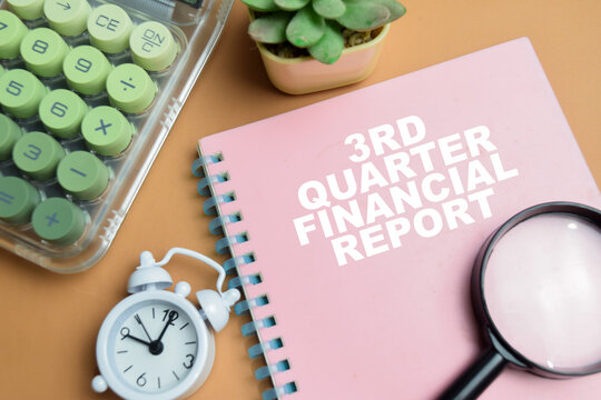 Concept of 3rd quarter financial report write on book isolated on table.