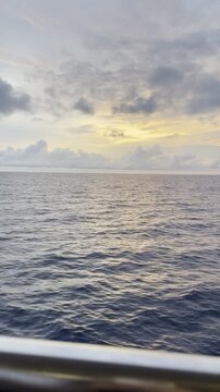 Golden sunset over the Andaman Sea from a boat in Thailand