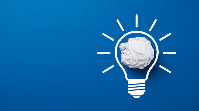 Creative light bulb with idea on blue background. Creative business idea, innovation and brainstorming
