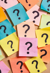 Fototapeta premium Problem solving and decision making concept, many colorful question marks on sticky notes, uncertainty and confusion