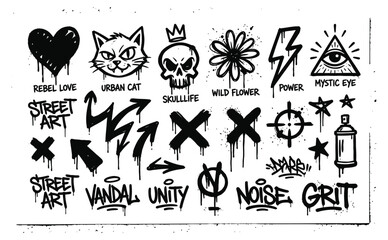 Fototapeta premium Collection of hand drawn graffiti style elements including skulls hearts arrows and urban typography isolated on a white textured paper background