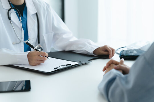 Professional psychologist conduct a consulting with sad patient in clinic