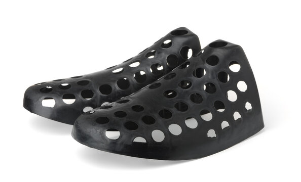 Pair of black plastic shoes tree inserts