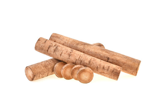 Burdock roots isolated on white background.
