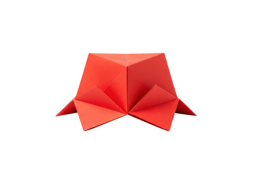 Geometric red origami sculpture with sharp angles and unique form isolated white background