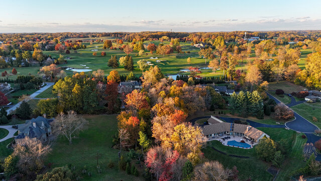 Aerial View of an Autumn Residential Neighborhood Near a Golf Course in Greenville, Delaware