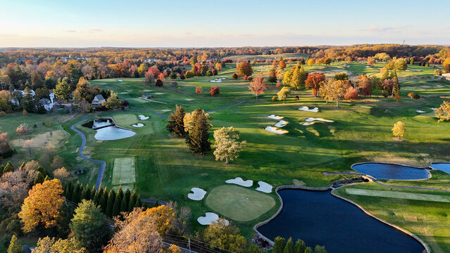 Aerial View of a Golf Course in Autumn with Colorful Fall Foliage in Greenville, Delaware