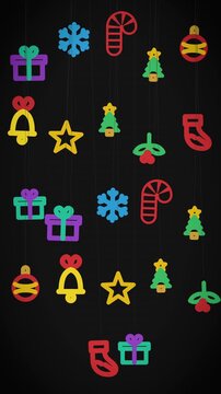 Bright Christmas decorations hang and move against a dark black background, creating a bold 3D-style vertical animation for seasonal ads, stories, and social media.