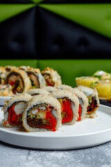 Delicious sushi roll with tobiko and shrimp tempura © Cavan