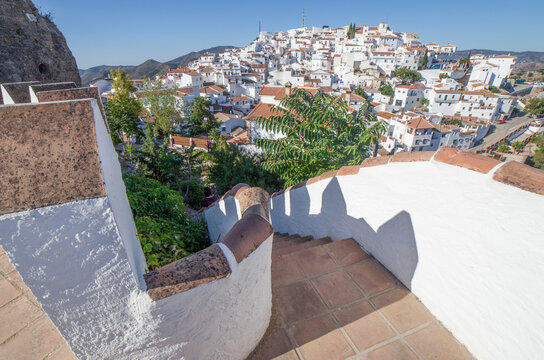 Whitewashed Spanish village on a sunny hillside