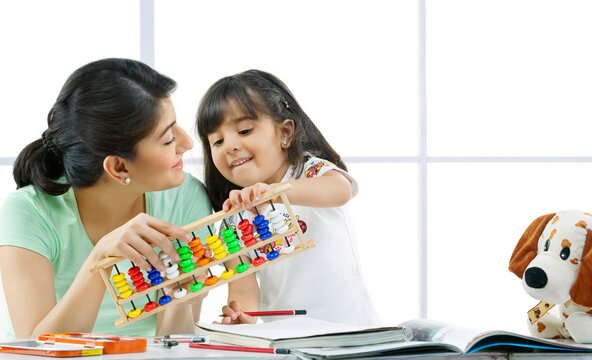 Mother and daughter with an abacus 