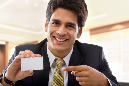 Businessman holding a business card 