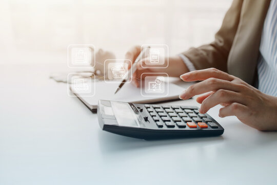 Business professional managing digital finance with virtual financial icons, representing financial planning, investment management, digital banking, budgeting, and smart business decisions.