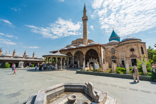 Mevlana Museum courtyard with Rumi mausoleum and minaret in Konya Turkey