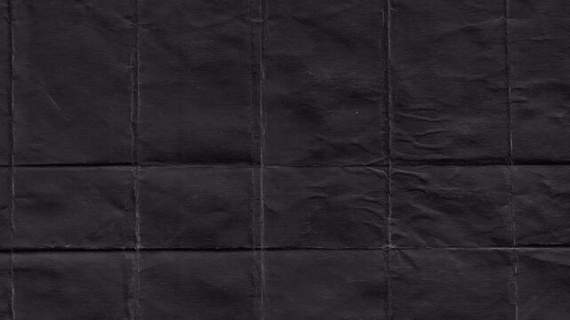 Abstract dark black paper texture with a grid pattern.