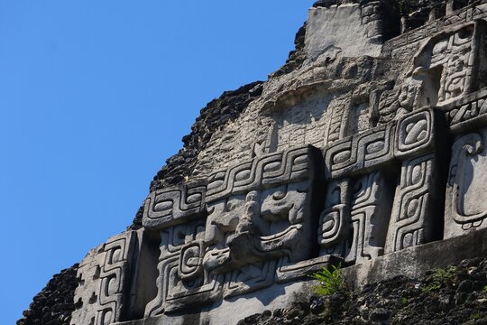 Macro cutout of the Xunantunich Maya Ruin frieze with blue sky, Belize