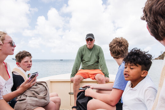 Multi generational family enjoying a boat ride