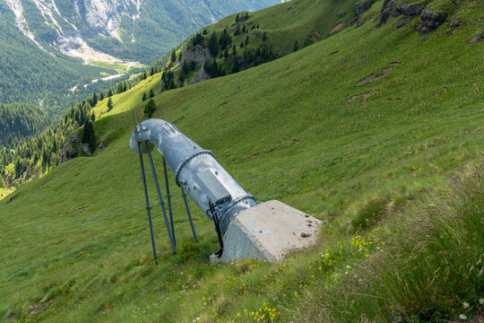 Arabba, Italy. Gas powered avalanche control installation on an alpine slope in the Dolomites