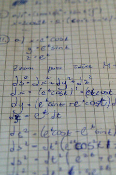 Close-up handwritten calculus notes differential equations