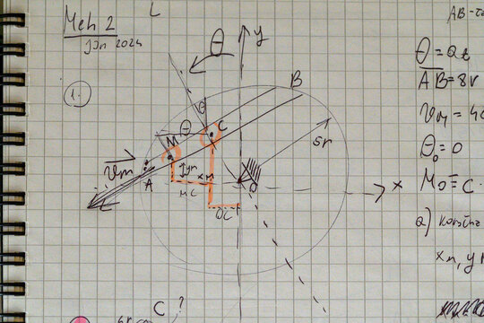 Mechanics notebook page with rolling disk diagram highlights