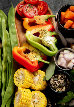 Assortment of colorful fresh vegetables for cooking.