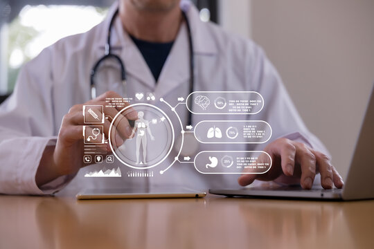 Doctor using a tablet with digital healthcare interface showing human body and organ data, representing medical technology, patient monitoring, diagnosis, telemedicine smart hospital innovation.