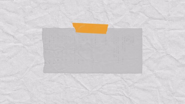 Minimalist grey paper note with orange adhesive tape on a textured background.