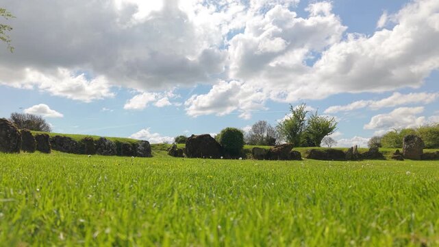 Grange Stone Circle With Lush Green Grass And White Clouds In The Background In County Limerick, Ireland. - wide shot