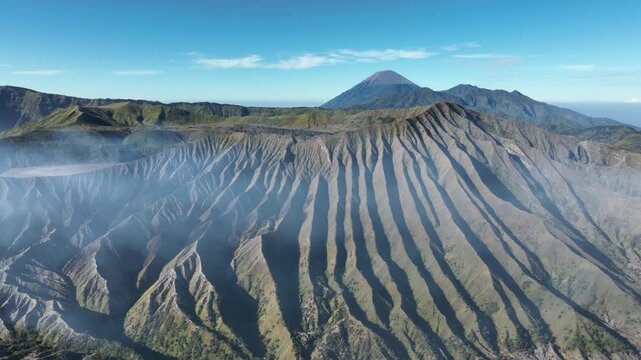 Dramatic fluted volcanic slopes of Mount Batok Tengger caldera East Java, Indonesia