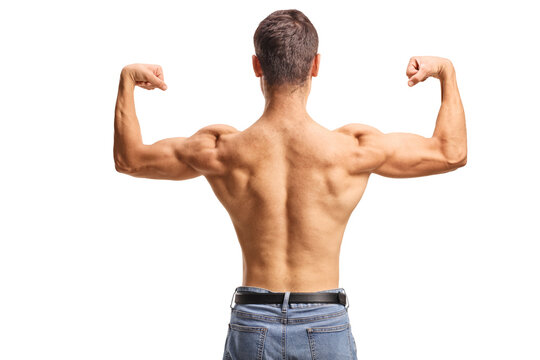 Rear view shot of a muscular man in jeans flexing his back and biceps