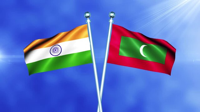 India and Maldives Flag Relations Concept with Crossed National Flags Waving on Pole Loop Against a Bright Cloudy Sky
