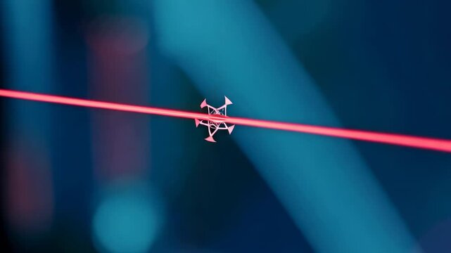 Laser beam emitted from a device creates visible patterns in a dark environment, showcasing the interaction of light with surrounding elements in a scientific setting